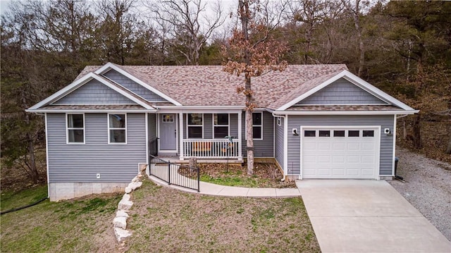 single story home featuring a front yard, driveway, roof with shingles, a porch, and an attached garage