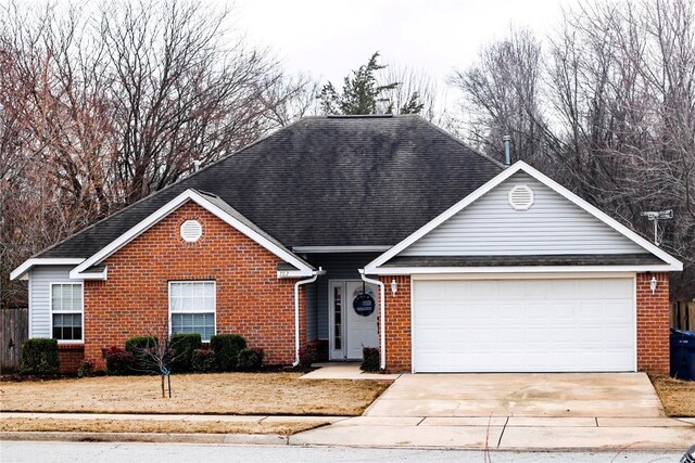 view of front of property featuring a garage