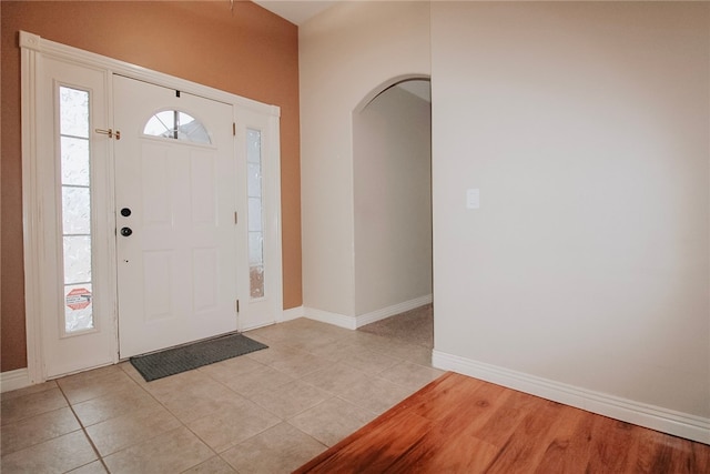 view of tiled foyer entrance