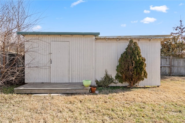 view of shed with fence