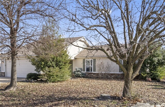 view of property exterior featuring a garage