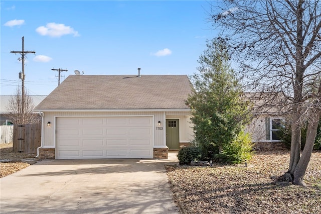 view of front facade with concrete driveway, brick siding, and an attached garage