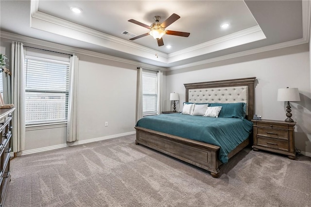 bedroom with crown molding, ceiling fan, a raised ceiling, and carpet