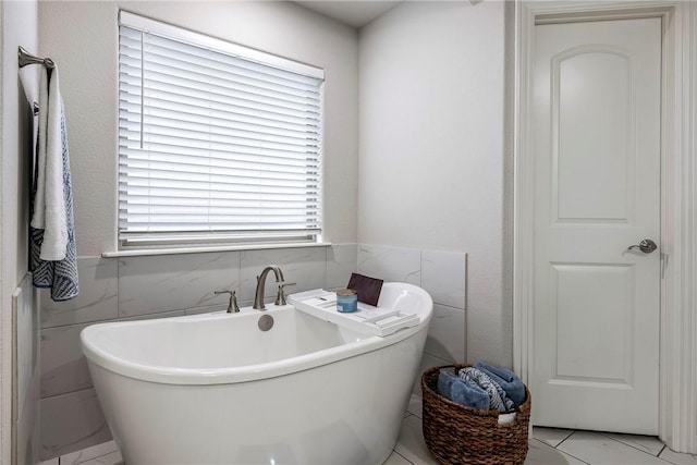 bathroom with a bathing tub