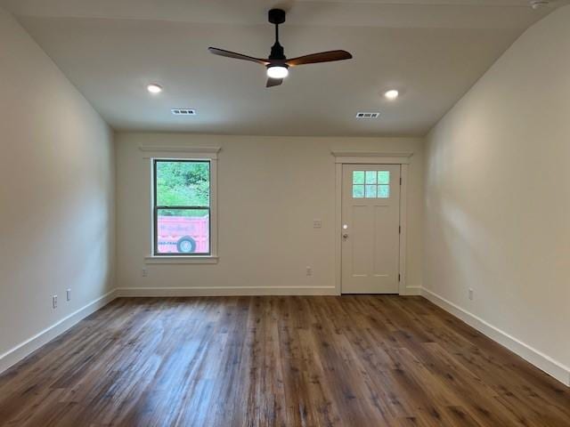 interior space featuring dark hardwood / wood-style floors and ceiling fan