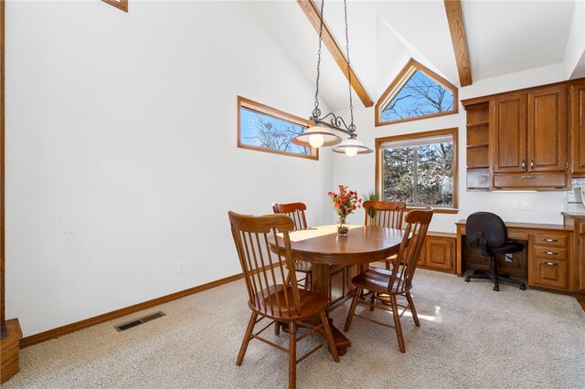21330 Ridgeview Dr, Garfield, AR 72732 - dining room with beam ceiling, high vaulted ceiling, and light carpet