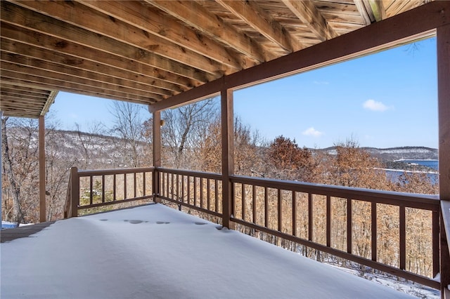 view of snow covered deck