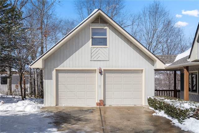 view of snow covered garage