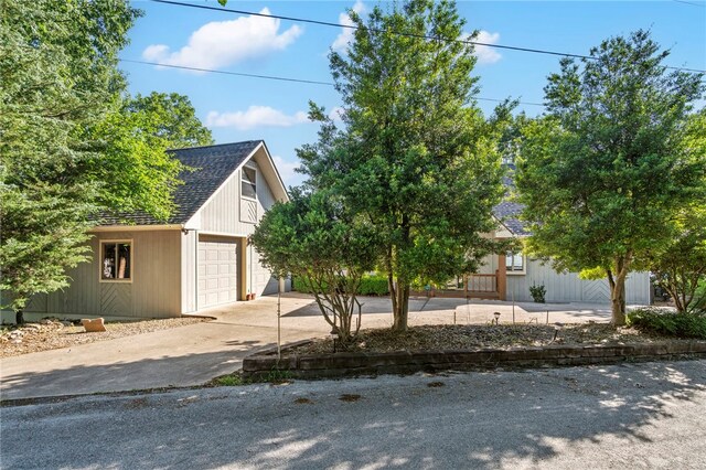 21330 Ridgeview Dr, Garfield, AR 72732 - view of front of property featuring a garage, concrete driveway, and a shingled roof