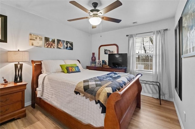 bedroom featuring ceiling fan and light wood-type flooring