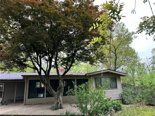1 Syston Ln, Bella Vista, AR 72714 - rear view of property featuring a deck