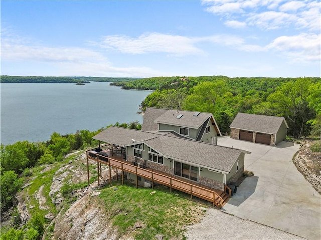 drone / aerial view with a water view