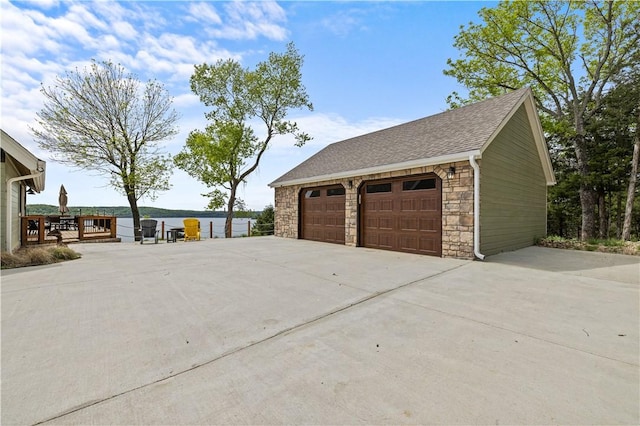 garage featuring a water view