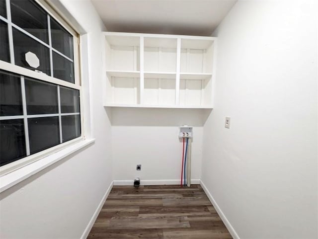 laundry room with dark wood-type flooring and hookup for an electric dryer