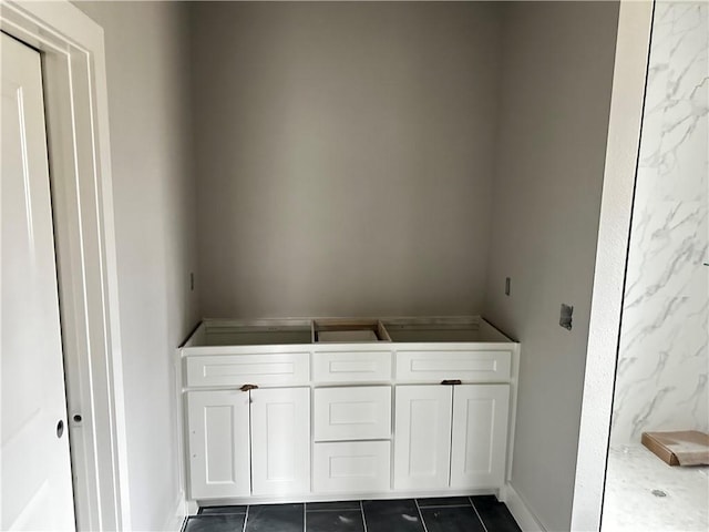 bathroom with tile patterned flooring