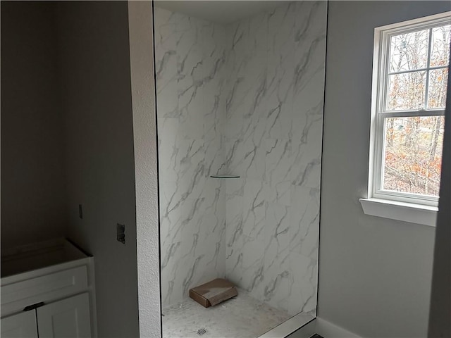 bathroom featuring vanity and a wealth of natural light