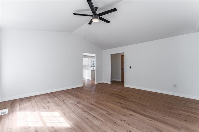 interior space featuring lofted ceiling, ceiling fan, and light hardwood / wood-style floors