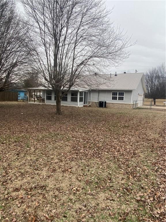 view of front of property featuring cooling unit