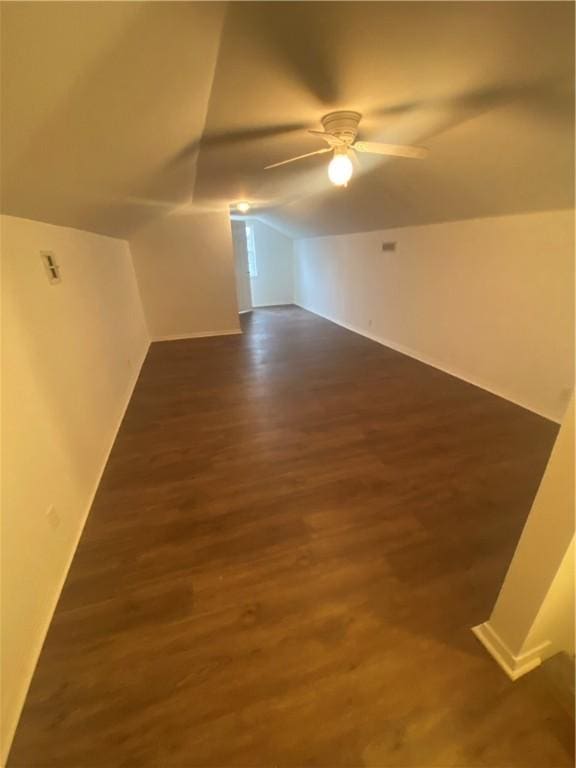 bonus room featuring ceiling fan, wood-type flooring, and vaulted ceiling