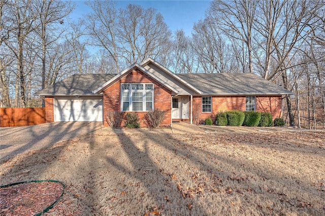 single story home featuring a garage