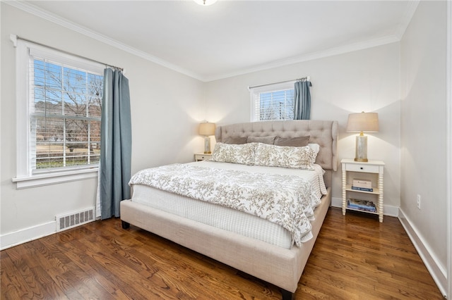 bedroom featuring dark wood-type flooring and crown molding