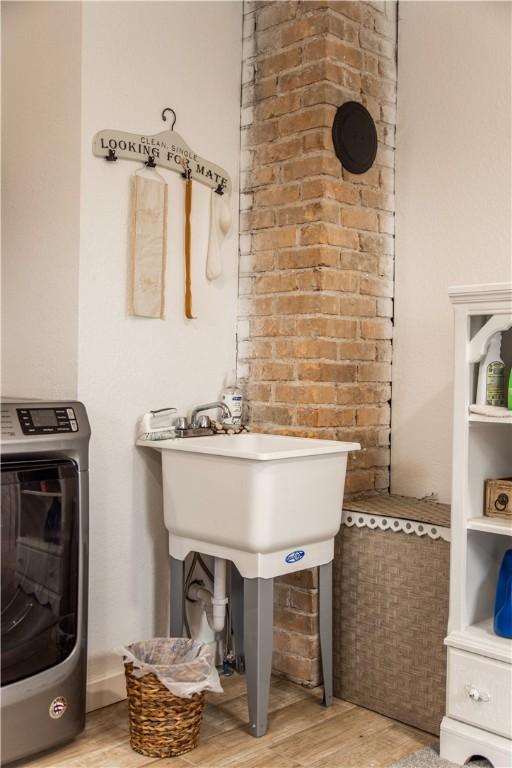 interior space featuring washer / dryer and light wood-type flooring