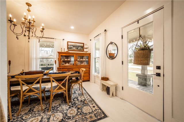 dining space with a chandelier and a healthy amount of sunlight