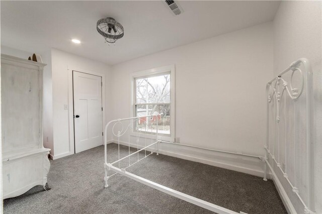 unfurnished bedroom featuring carpet floors