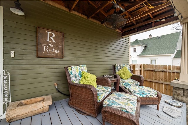 deck with fence and ceiling fan