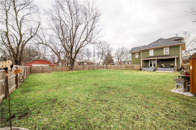 view of yard featuring a fenced backyard