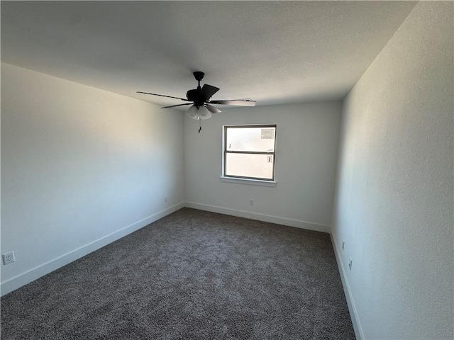 empty room with baseboards, carpet, and ceiling fan