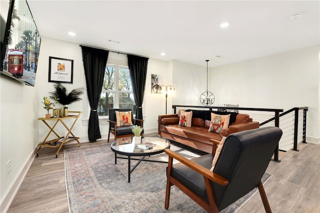 living room with light hardwood / wood-style floors