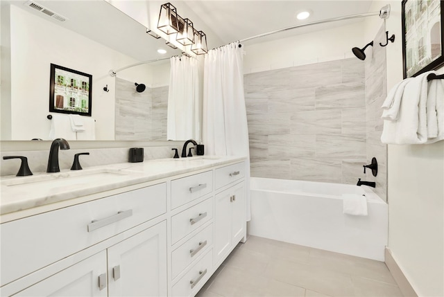 bathroom featuring tile patterned flooring, vanity, and shower / tub combo with curtain