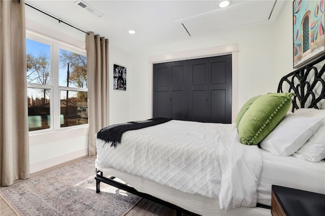 bedroom featuring hardwood / wood-style floors