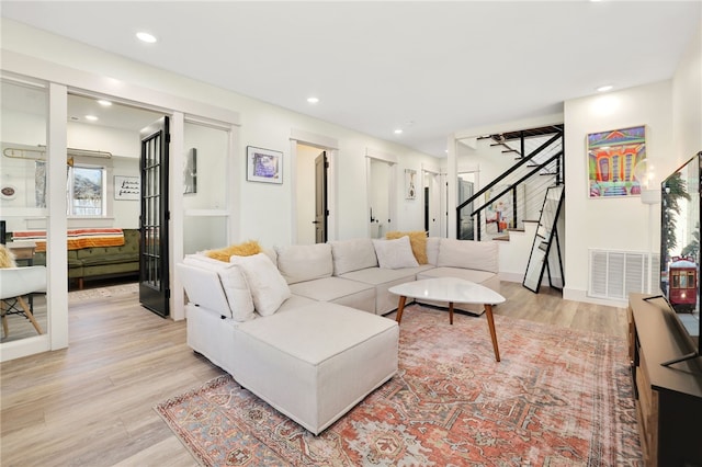 living room featuring light hardwood / wood-style floors