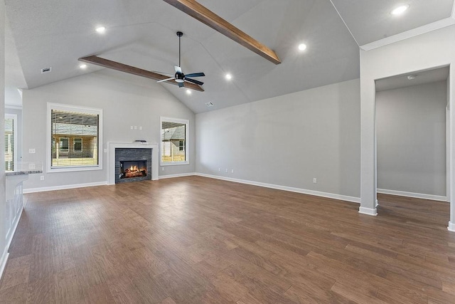 1440 Tiffany St, Centerton, AR 72719 - unfurnished living room with a ceiling fan, beam ceiling, a warm lit fireplace, dark wood-style flooring, and recessed lighting