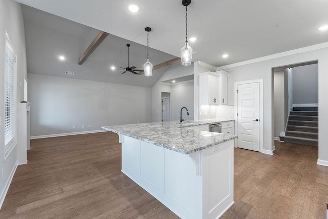 1440 Tiffany St, Centerton, AR 72719 - kitchen featuring lofted ceiling, white cabinetry, a peninsula, a ceiling fan, and a kitchen bar