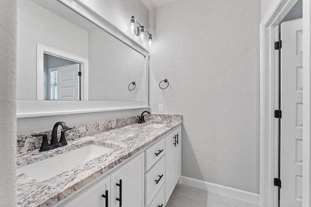 1440 Tiffany St, Centerton, AR 72719 - full bathroom featuring baseboards and double vanity