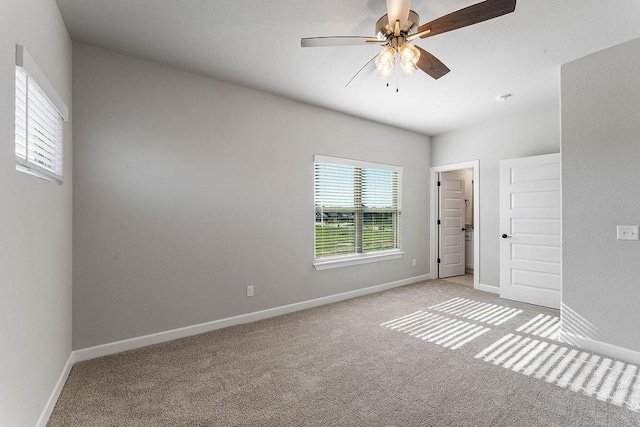1440 Tiffany St, Centerton, AR 72719 - unfurnished bedroom with light carpet and ceiling fan