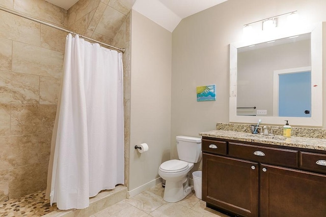 bathroom featuring vanity, tile patterned floors, toilet, and a shower with shower curtain