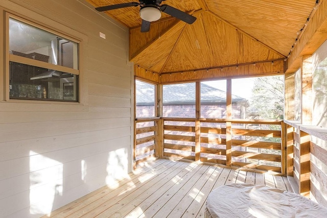 exterior space with ceiling fan, lofted ceiling, and wooden ceiling