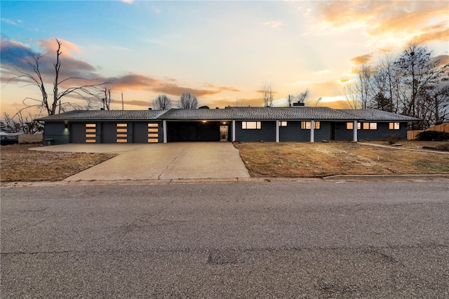 ranch-style home with a garage