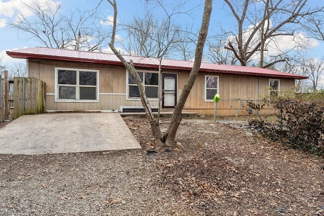 rear view of house featuring a patio area