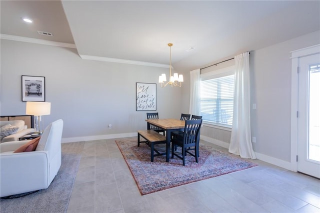 dining space with an inviting chandelier, visible vents, baseboards, and ornamental molding