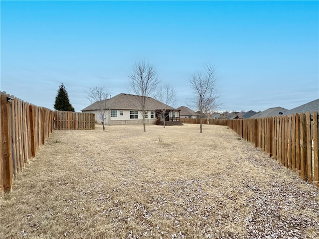 view of yard featuring a fenced backyard