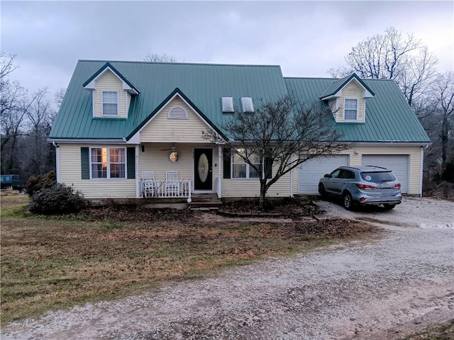 view of front of home featuring a garage and covered porch