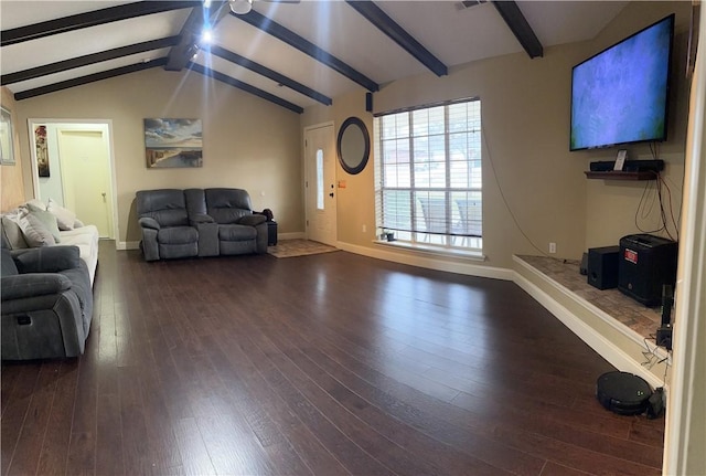 unfurnished living room with dark hardwood / wood-style flooring and lofted ceiling with beams