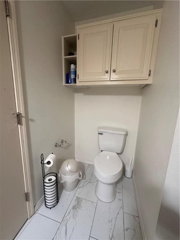 bathroom featuring toilet