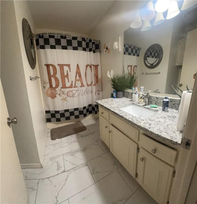 bathroom with vanity and walk in shower