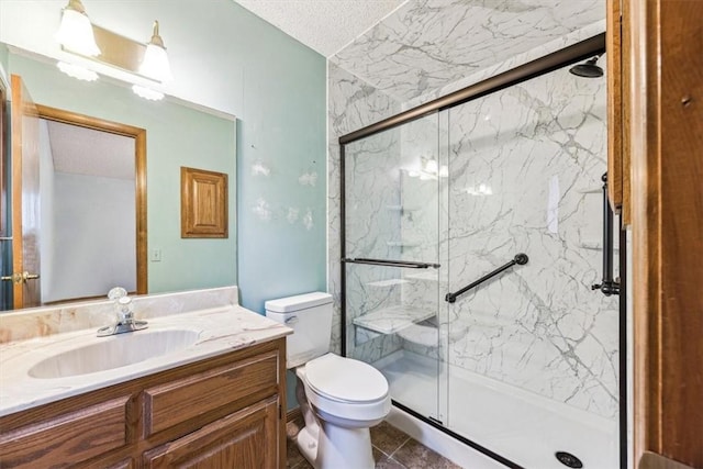 bathroom with walk in shower, vanity, and toilet